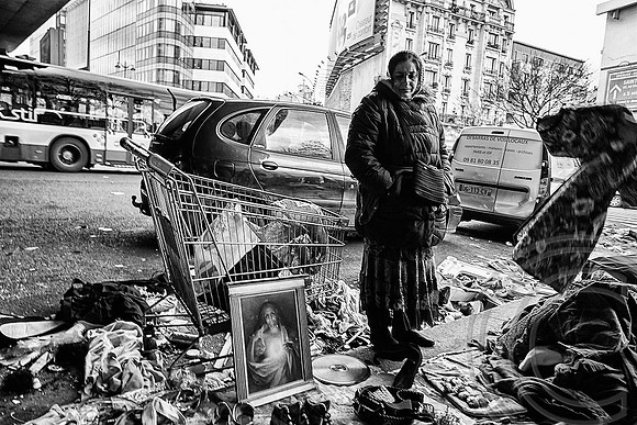 Paris refugee market thrives alongside the city's richest antiques