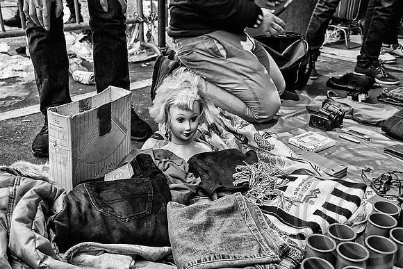 Paris refugee market thrives alongside the city's richest antiques