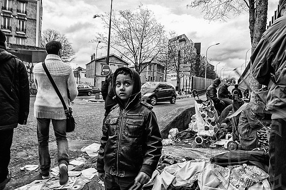 Paris refugee market thrives alongside the city's richest antiques