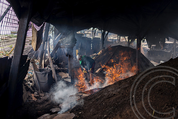Charcoal harvesting rife in Manila's slums